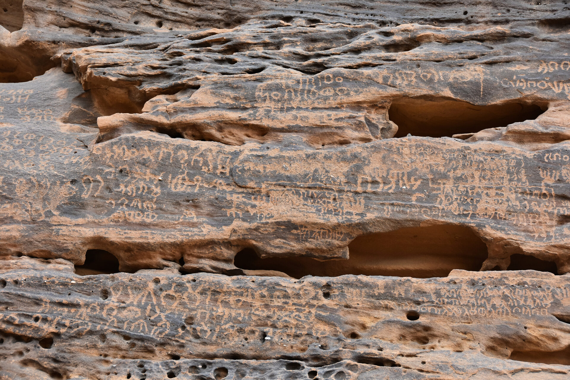 Ancient rock inscriptions and carvings at Jabal Ikmah, AlUla, dating to the 1st millennium BC