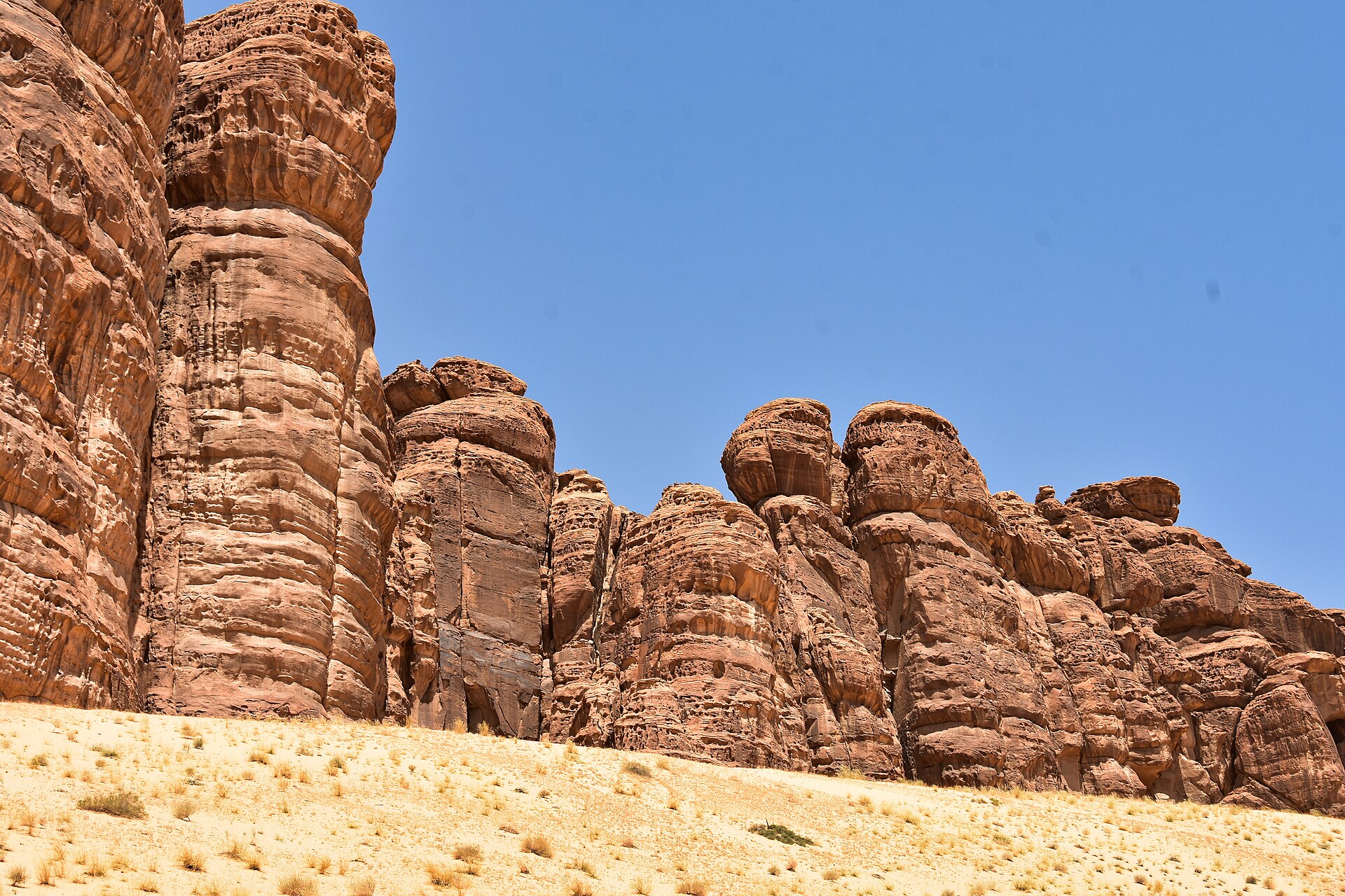Sandstone rock formations and desert landscape in AlUla, Saudi Arabia