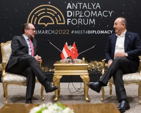 Turkish Foreign Minister Mevlut Cavusoglu and Austrian Foreign Minister Alexander Schallenberg conduct a bilateral session at the Antalya Diplomacy Forum, March 2022 — the same venue and format in which Prince Faisal bin Farhan convened with Turkish, Egyptian, and Pakistani counterparts on April 17, 2026, while Iran declared the Strait of Hormuz completely open