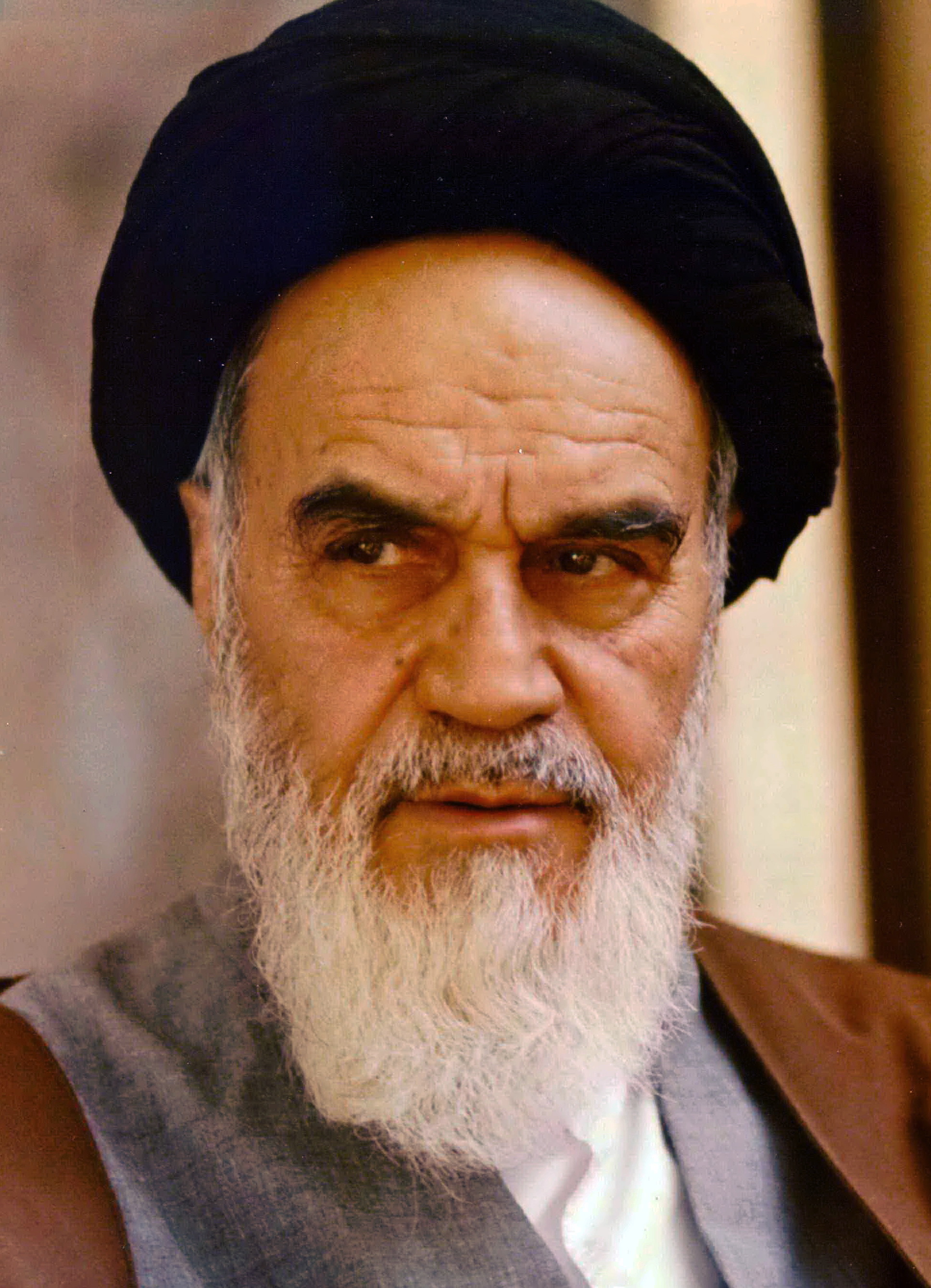 Ayatollah Ruhollah Khomeini, founder of the Islamic Republic of Iran and architect of velayat-e faqih — the doctrine of guardian jurist sovereignty whose theoretical coherence now depends on a functioning Supreme Leader