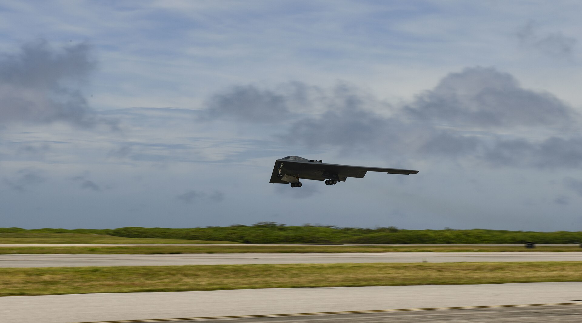 A B-2 Spirit stealth bomber takes off from Naval Support Facility Diego Garcia — the same aircraft that struck Fordow, Natanz, and Isfahan in June 2025, producing what Trump now calls Iran's 'nuclear dust.' Photo: US Air Force / Public Domain