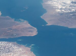 Bab al-Mandeb strait from the ISS — the narrow gap between Yemen (right) and Djibouti (left) visible from orbit. NASA / Public Domain