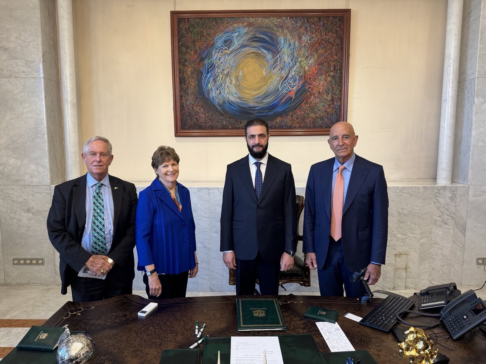 US Special Envoy Tom Barrack (right) with Syrian President Ahmad al-Sharaa and US Congressional delegation in Damascus presidential palace, 2025