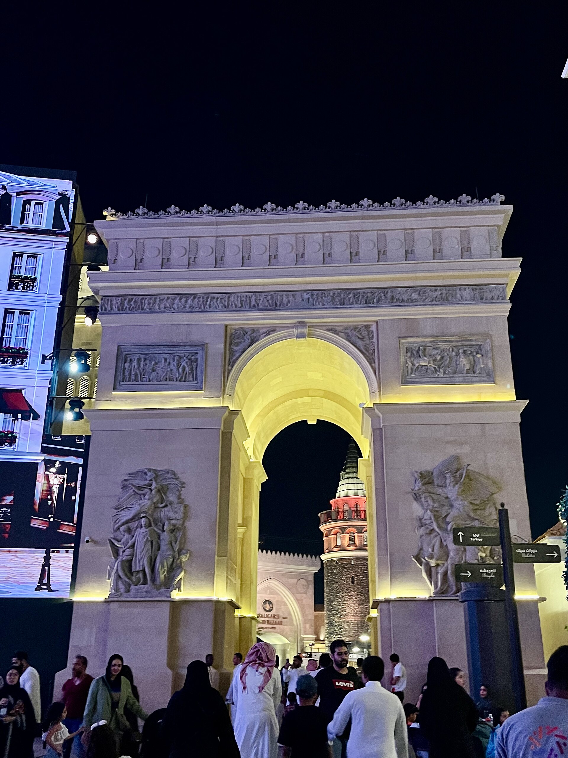 Replica of the Arc de Triomphe in Boulevard World Riyadh France Zone at night