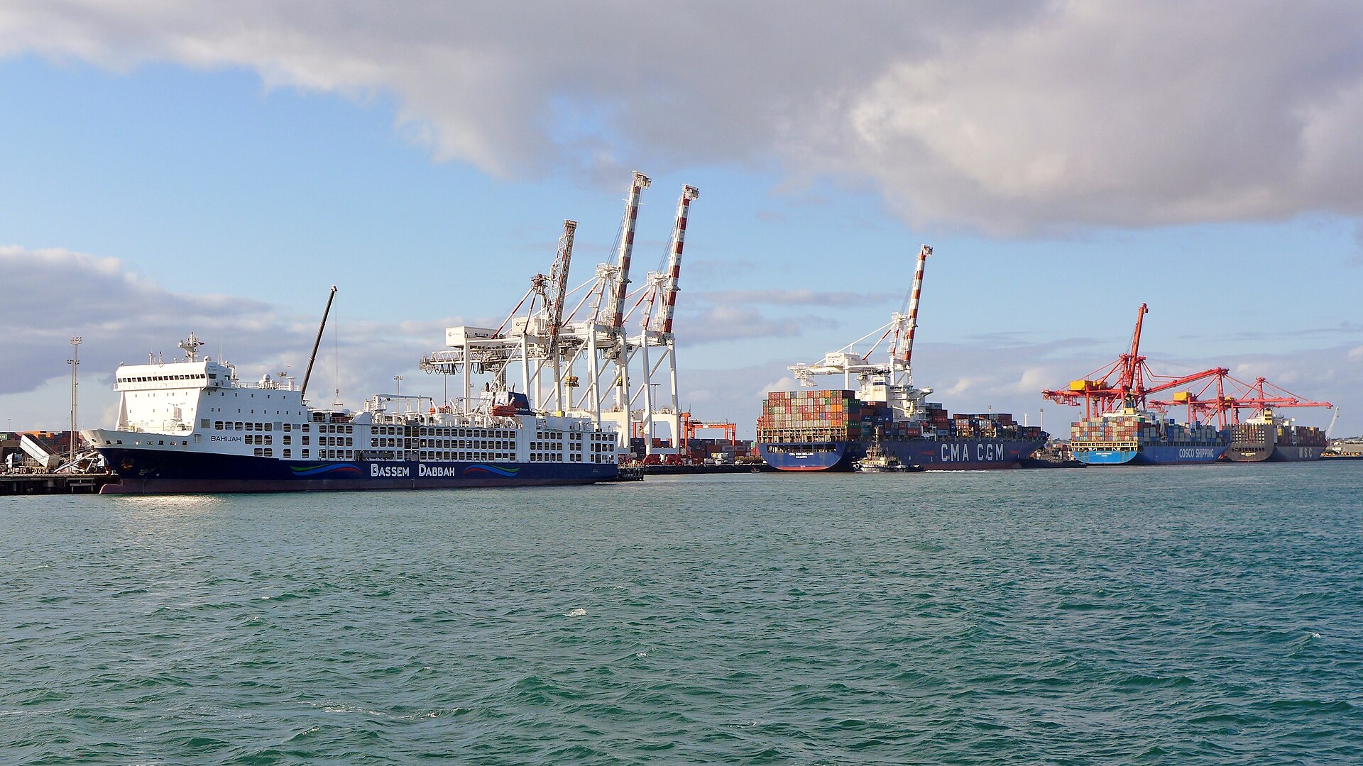 Container ships berthed at commercial port quay with cranes, similar to Khalifa Bin Salman Port in Bahrain where MSC Ishyka was moored on April 4, 2026