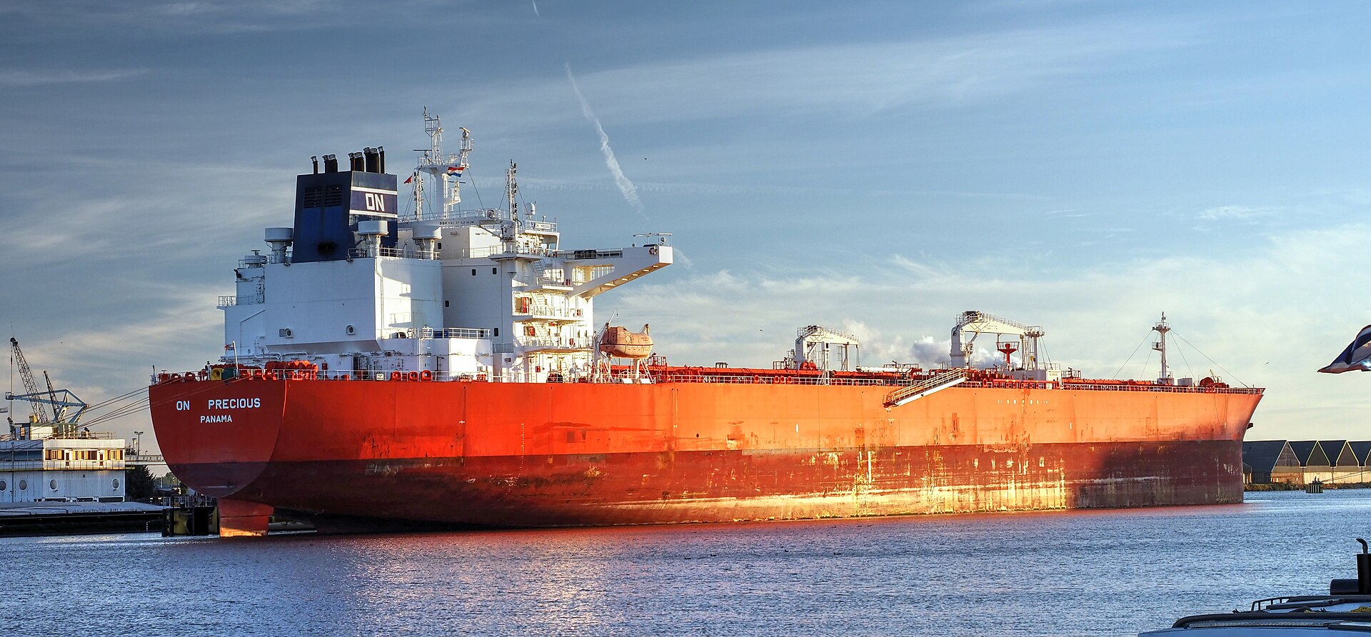 Crude oil supertanker On Precious at port — VLCC crude oil carrier representing the physical oil market where prices reached $148/bbl in April 2026