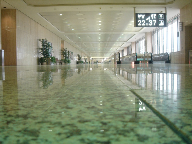 The spacious concourse inside King Fahd International Airport's main passenger terminal