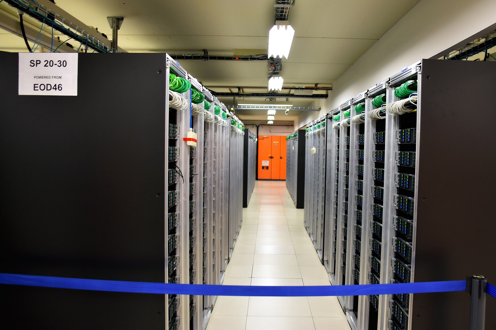 Data center server racks inside a hyperscale computing facility, the type of AI infrastructure Humain plans to build across Saudi Arabia