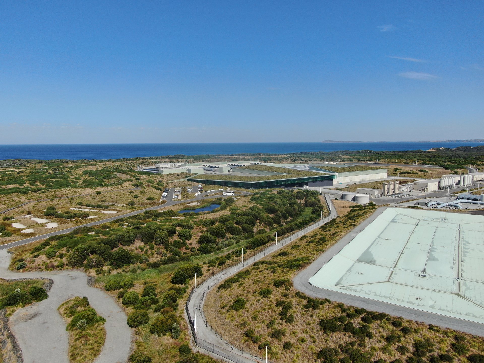 Aerial view desalination plant reverse osmosis seawater treatment facility Gulf coast