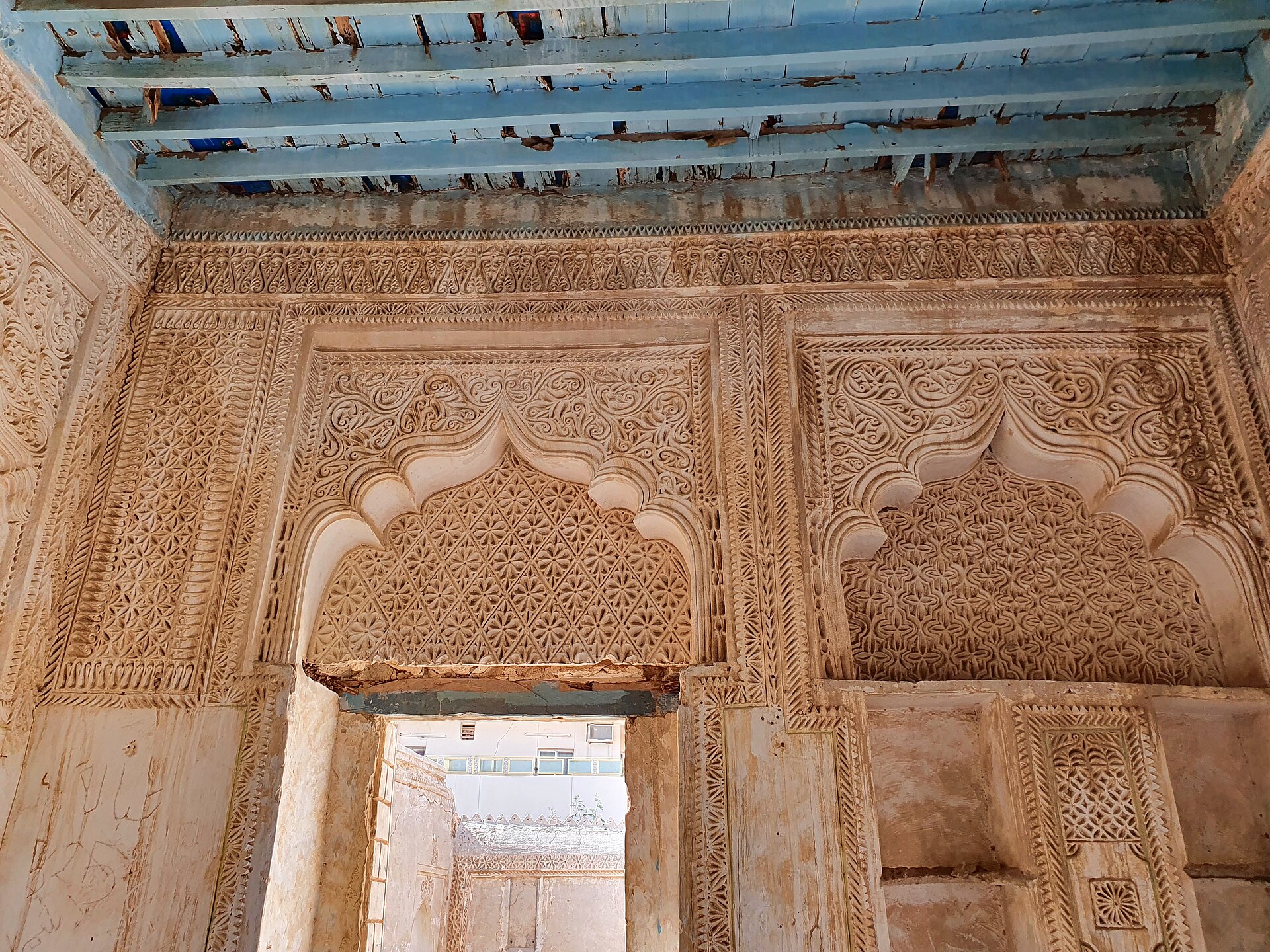 Intricate carved gypsum and coral-stone interior of Al-Rifai House, a pearl merchant's mansion on Farasan Island
