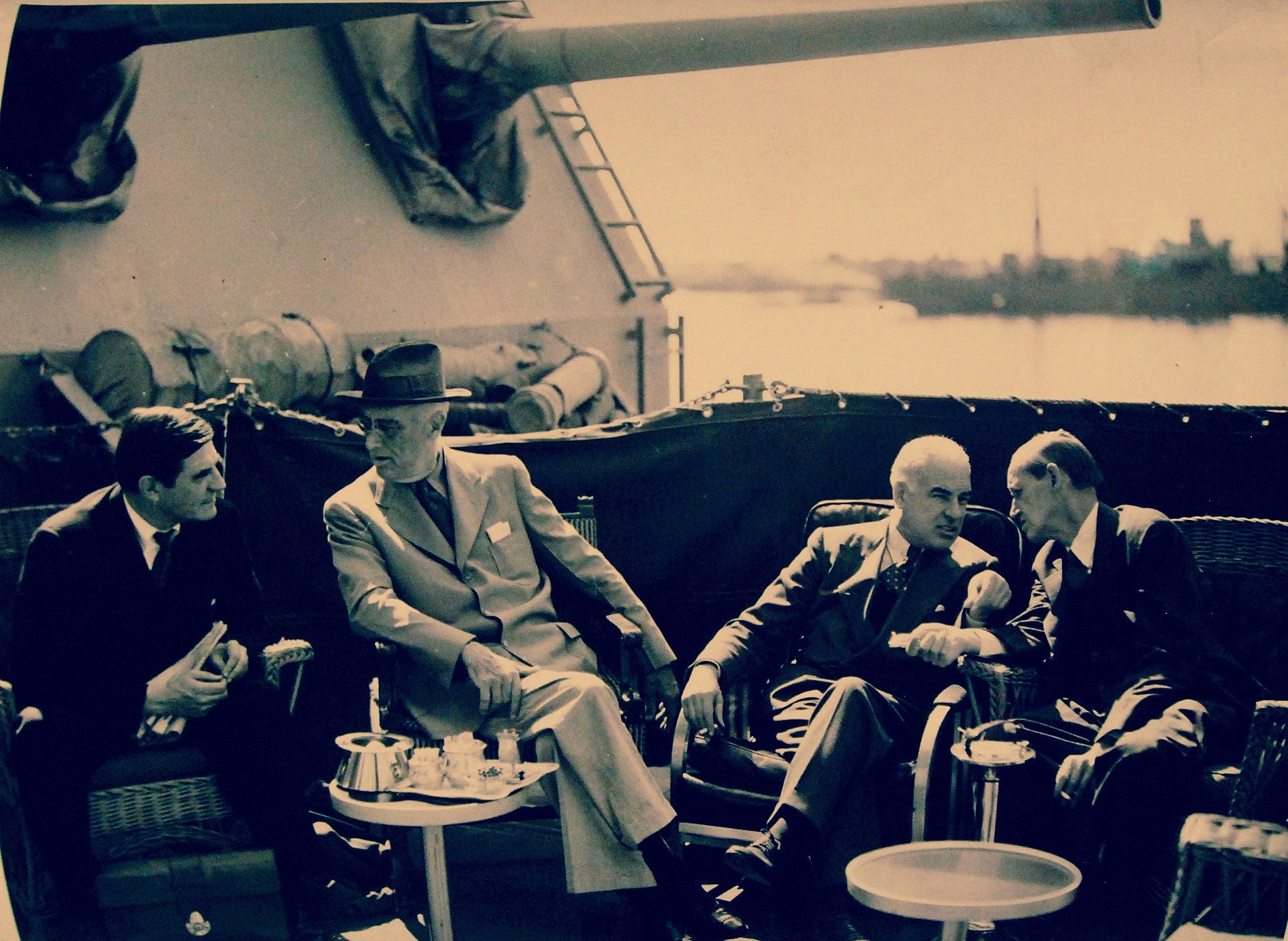 President Franklin D. Roosevelt meets with Saudi King Ibn Saud and other Middle East monarchs aboard USS Quincy in the Great Bitter Lake, February 1945, establishing the foundation of the US-Saudi security compact