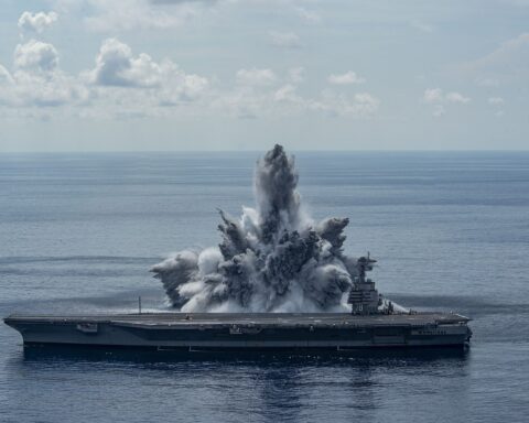 USS Gerald R. Ford (CVN-78) during full-ship shock trial in the Atlantic Ocean, 2021. The carrier is the lead ship of its class and one of two Ford-class carriers deployed to the Gulf of Oman during the CENTCOM blockade.
