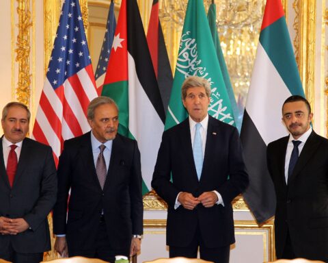 Saudi Arabia and UAE foreign ministers with Secretary Kerry and Jordan FM at multilateral meeting, June 2014, flags of Saudi Arabia and UAE prominently displayed