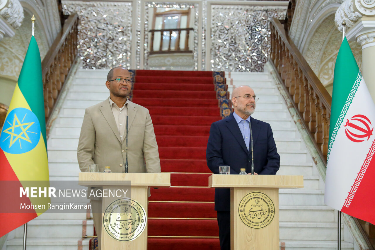 Mohammad Bagher Ghalibaf, Speaker of Iran's Islamic Consultative Assembly, at the parliament podium in Tehran — Ghalibaf led Iran's 71-member delegation to the Islamabad talks while IRGC commanders Vahidi and Abdollahi retained operational authority beyond his reach