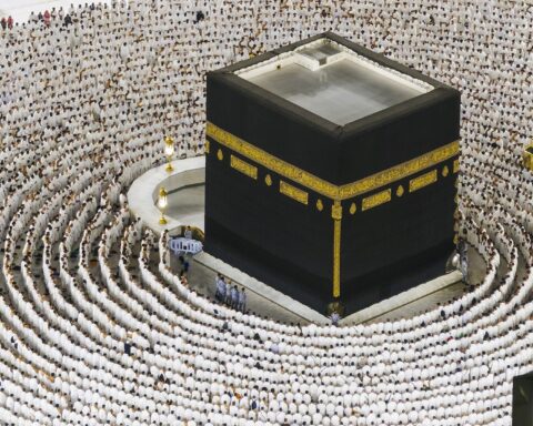 Aerial view of thousands of pilgrims in white circumambulating the Kaaba at the Grand Mosque in Mecca during Hajj 2026