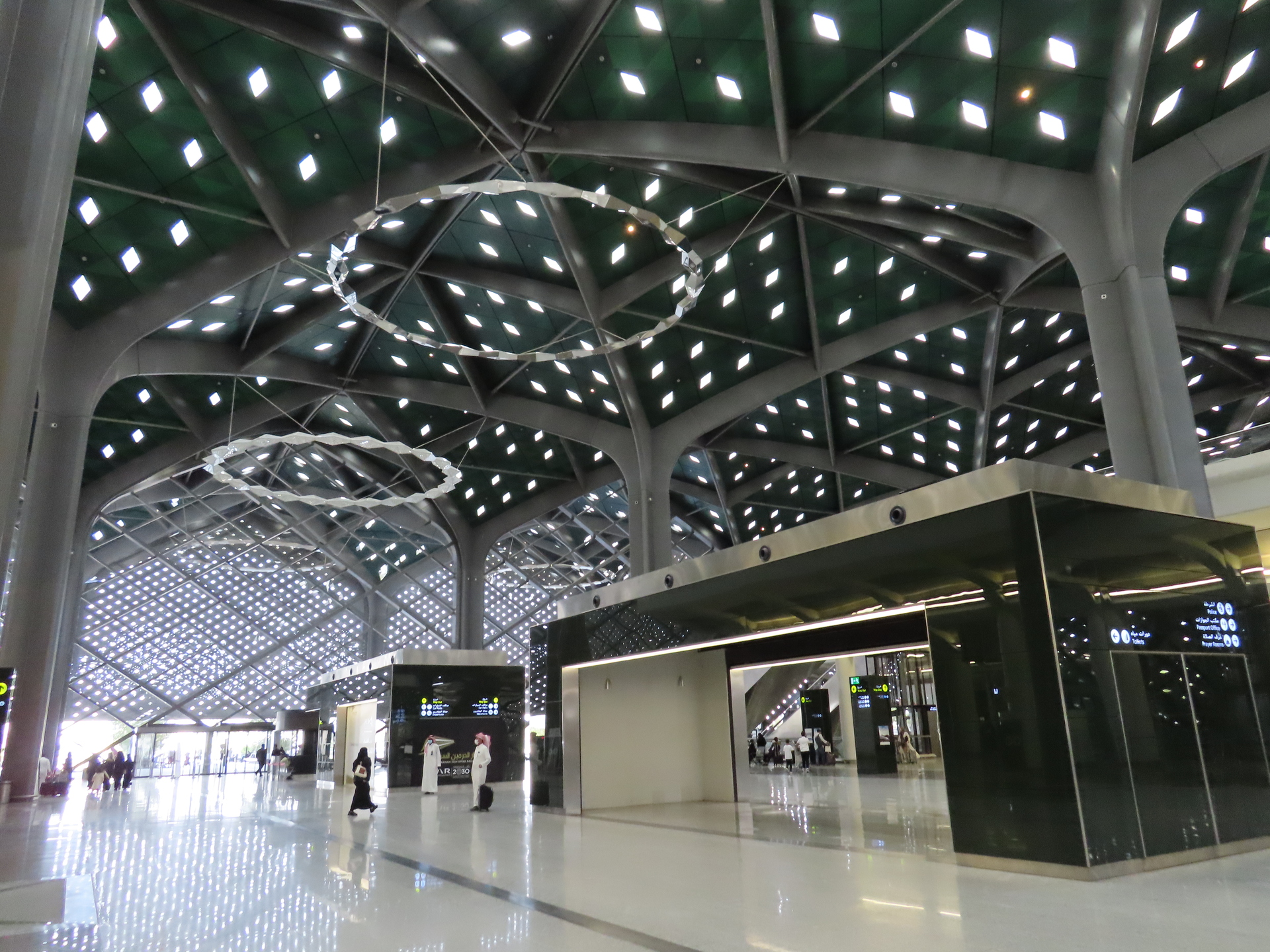 Interior of the Haramain High Speed Railway station with modern steel and glass canopy ceiling