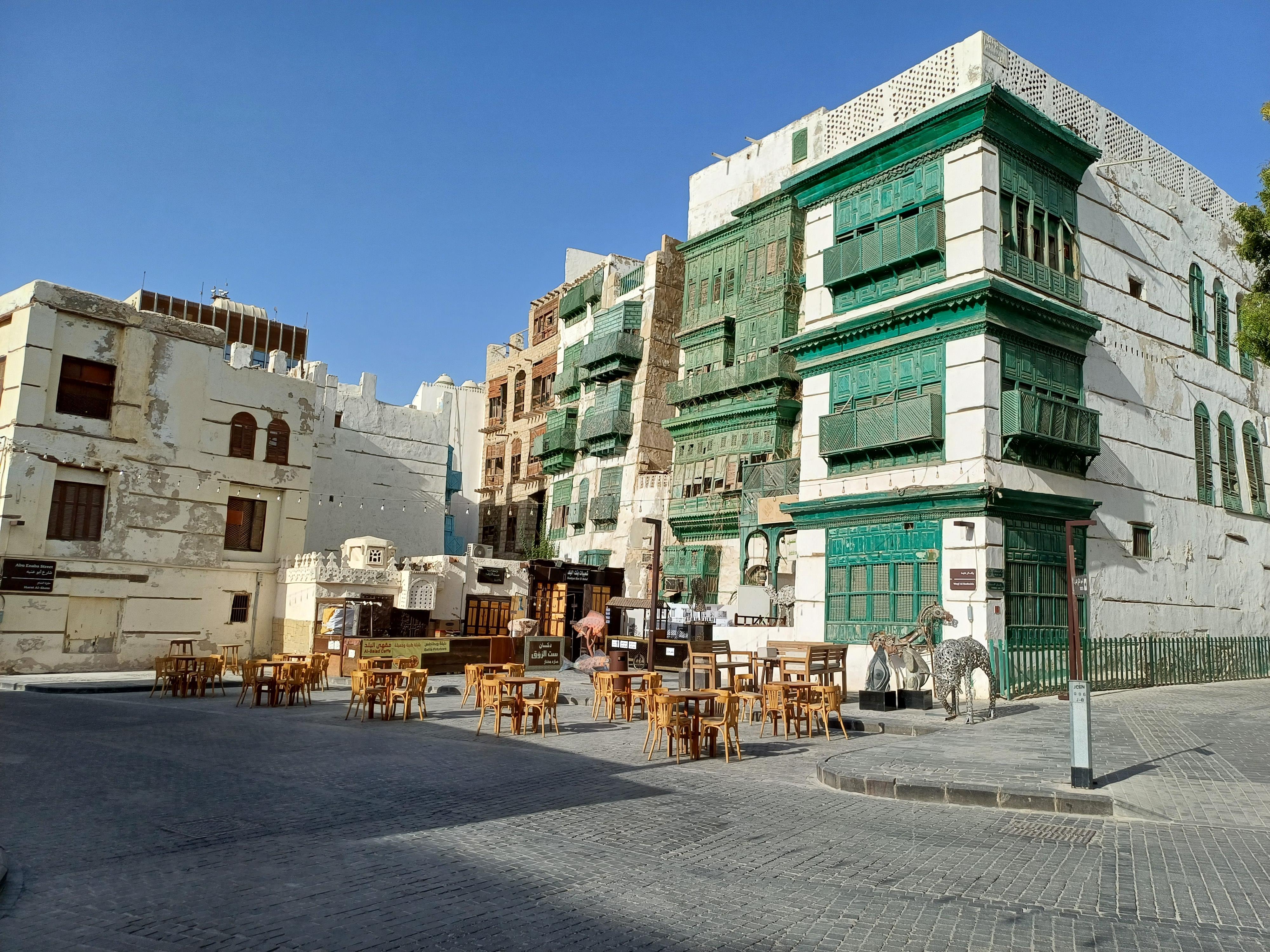Historic Al-Balad district in Jeddah with traditional coral stone buildings and green mashrabiya screens