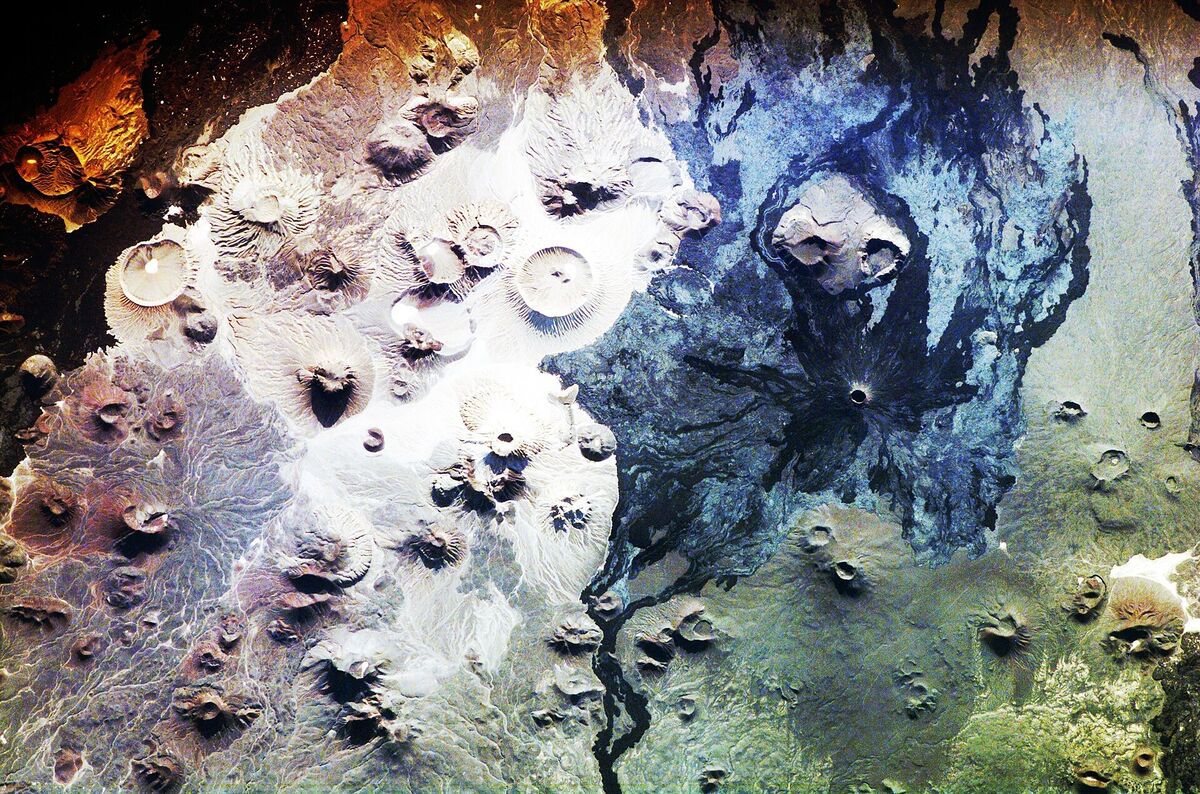 Satellite image of Harrat Khaybar showing the contrast between white volcanic domes and black basalt lava fields in Saudi Arabia