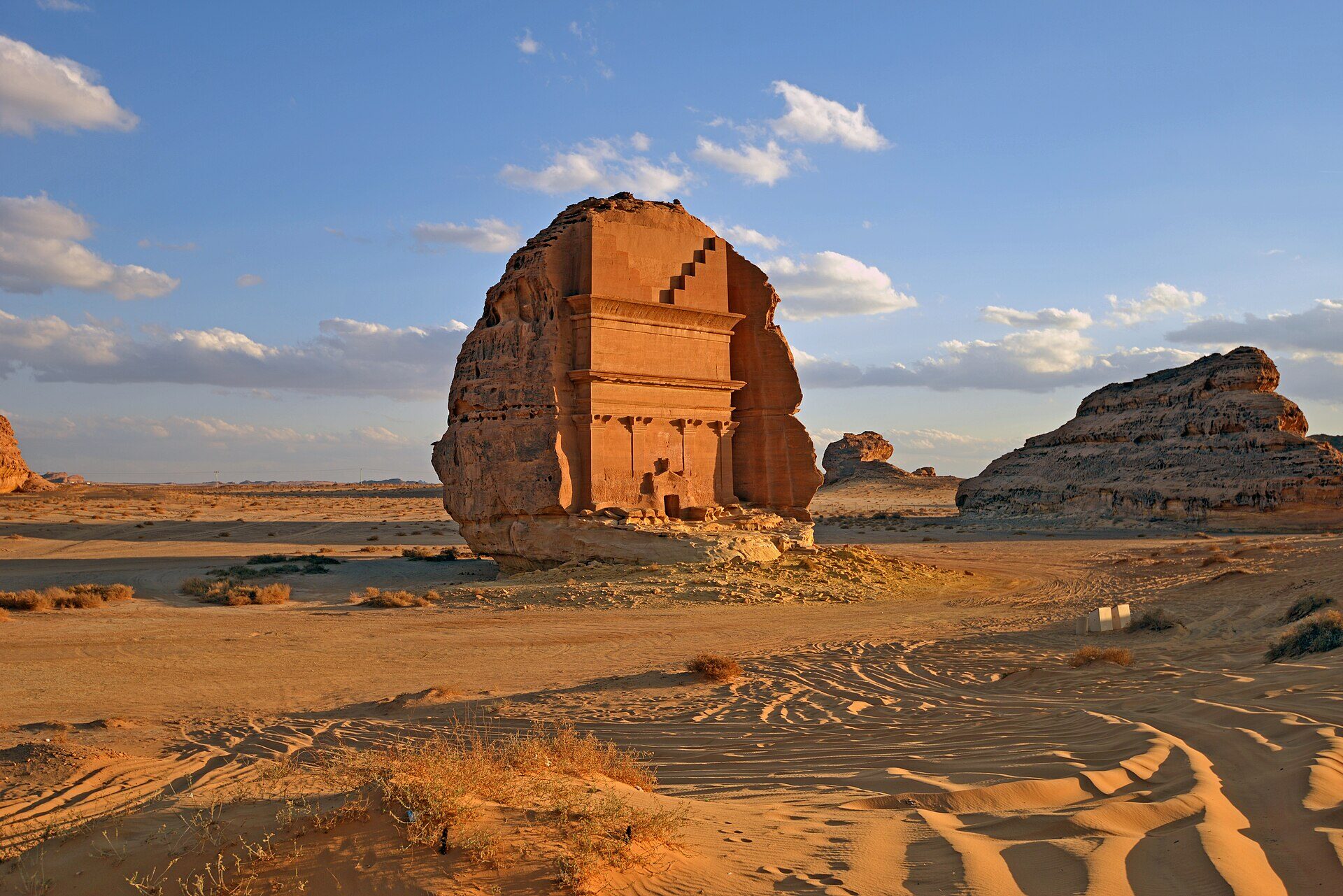 Qasr al-Farid, a monumental Nabataean rock-cut tomb carved into an isolated sandstone outcrop at Hegra, Saudi Arabia