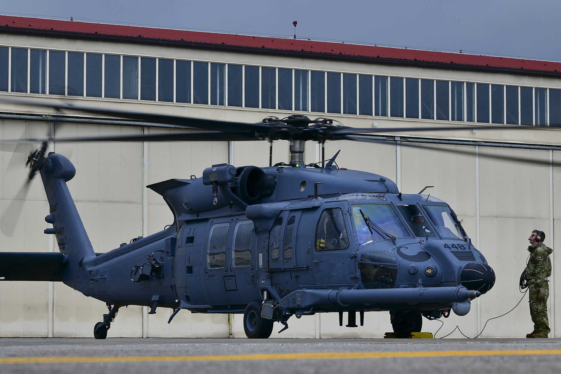 HH-60W Jolly Green II combat search and rescue helicopter of the 56th Rescue Squadron prepares for training flight at Aviano Air Base, Italy — the same aircraft type deployed for CSAR operations over Iran