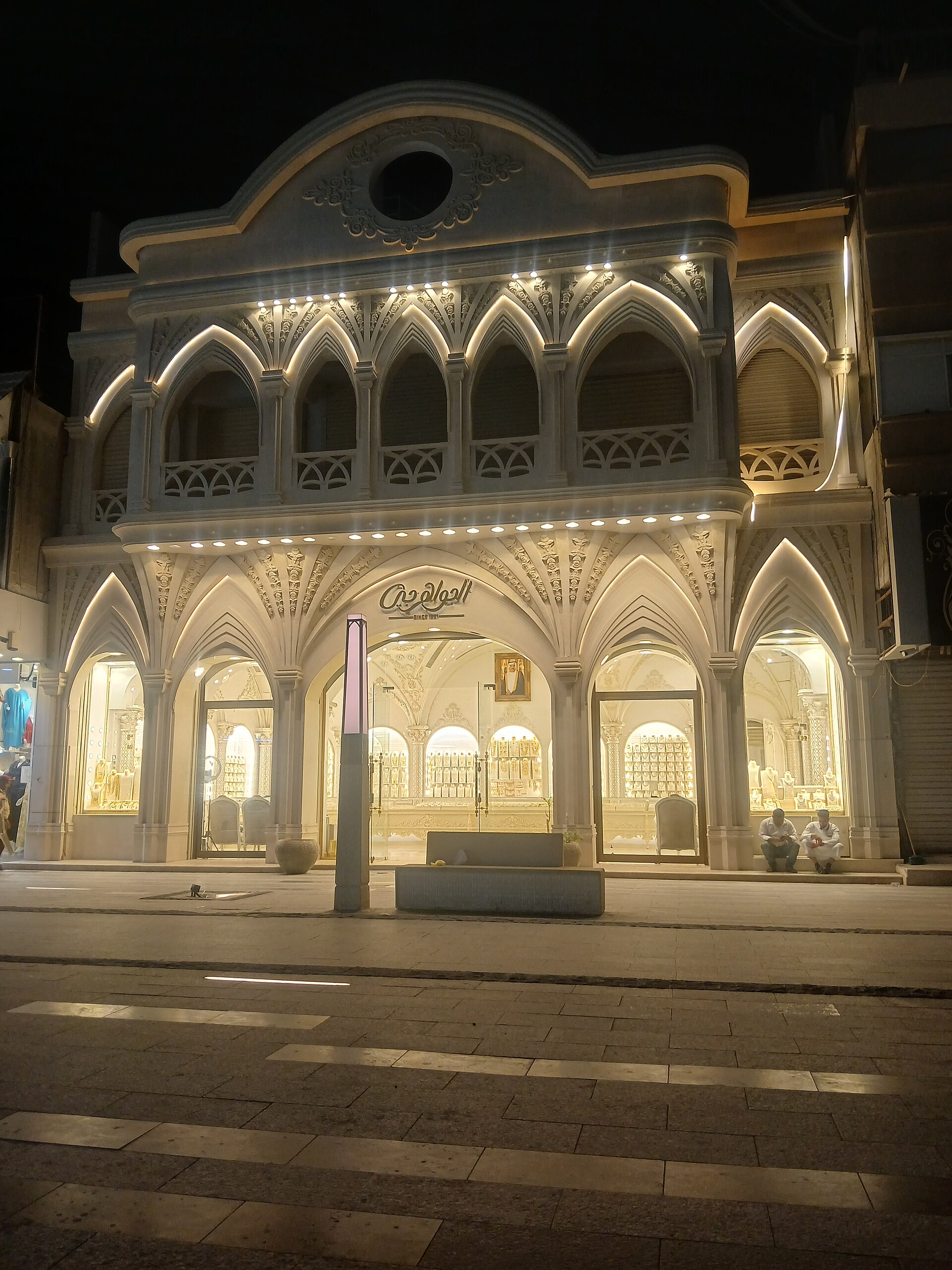 Al Jawary gold souq in Hofuf illuminated at night with ornate architectural facade