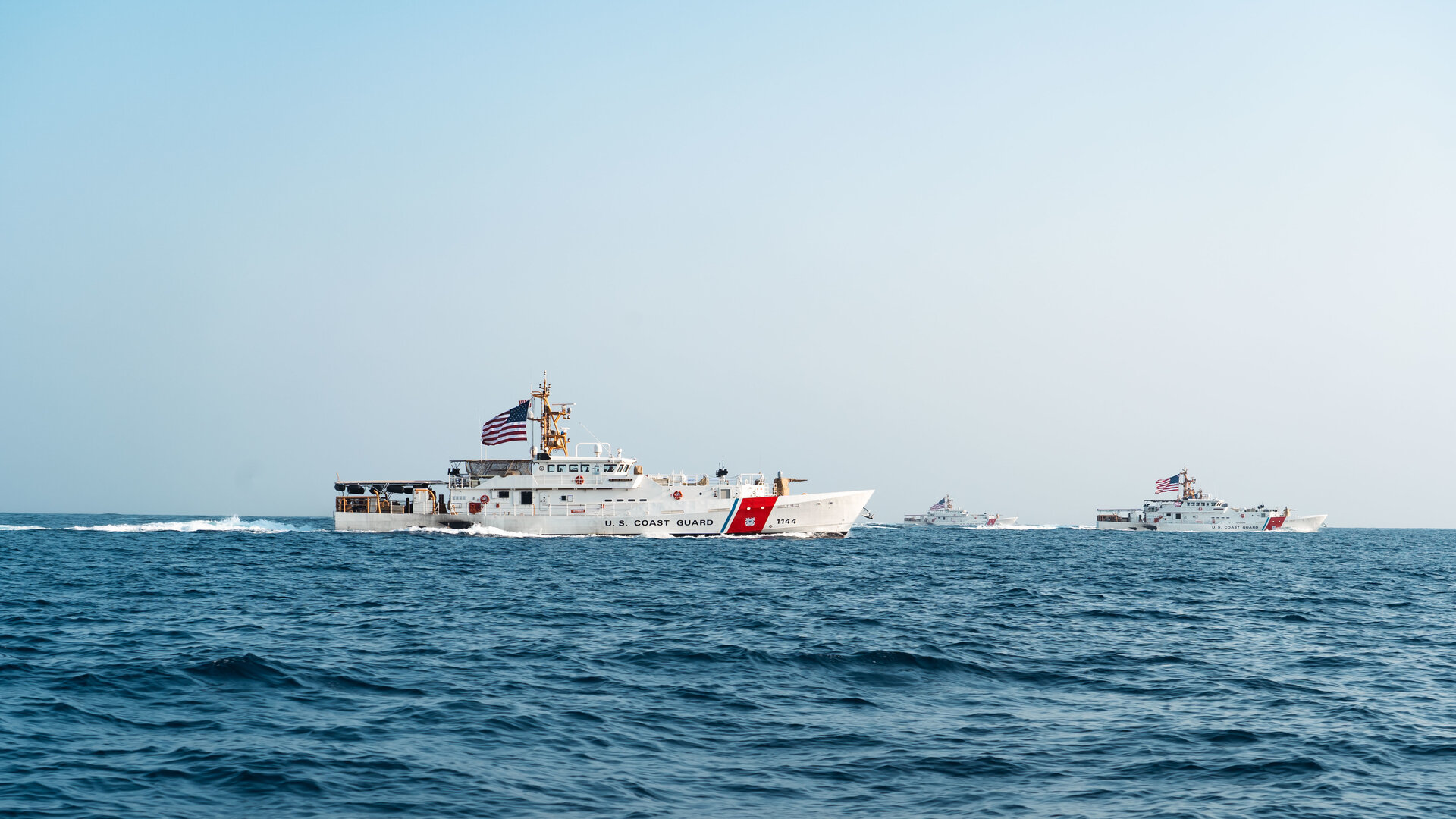 Three US Coast Guard fast response cutters transit the Strait of Hormuz in formation, August 2022