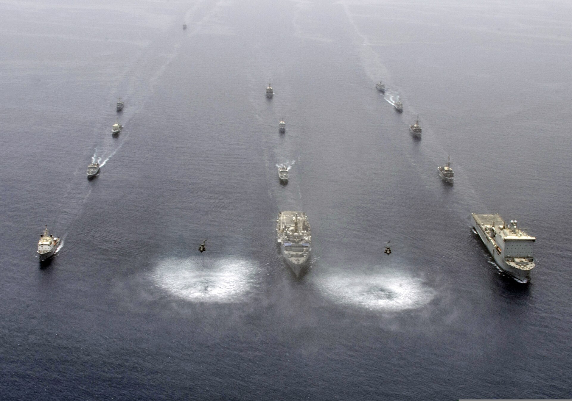 Multinational fleet in formation in the Persian Gulf during IMCMEX 2013 International Mine Countermeasures Exercise — the largest Gulf mine-clearance coalition exercise before the April 2026 Hormuz crisis