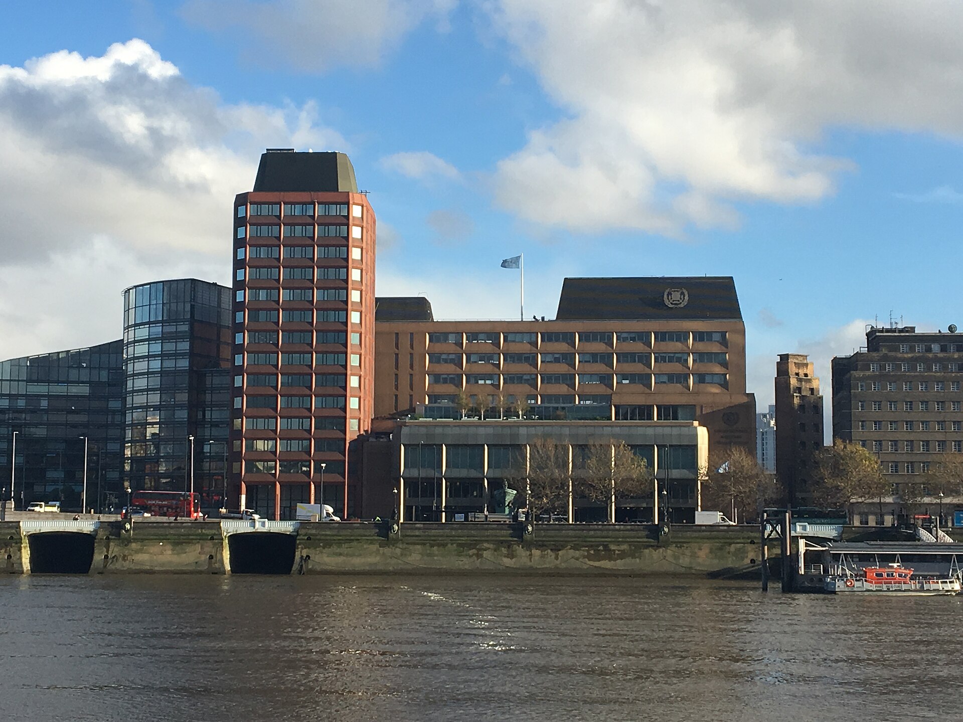 International Maritime Organization headquarters on Albert Embankment, London, with IMO flag flying above the building