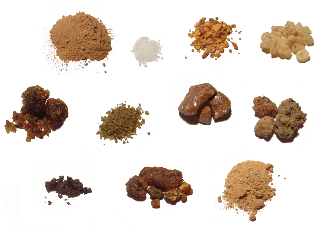 Various forms of raw incense including frankincense resin, myrrh and ground incense powder