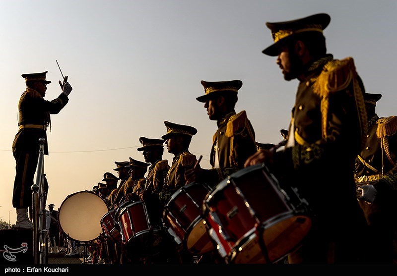 Iranian Artesh (regular army) military band at the National Army Day parade, Tehran — the same annual parade held continuously since the revolution, including through the Iran-Iraq War, that was cancelled in 2026