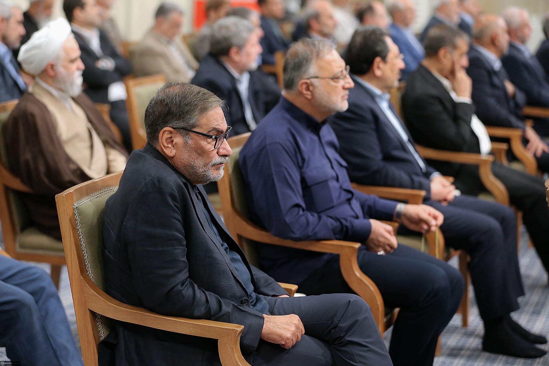 Iranian government officials at a cabinet session with Supreme Leader Khamenei — the political class whose systematic targeting since February 28, 2026 reached a new threshold with the strike on diplomat Kamal Kharazi
