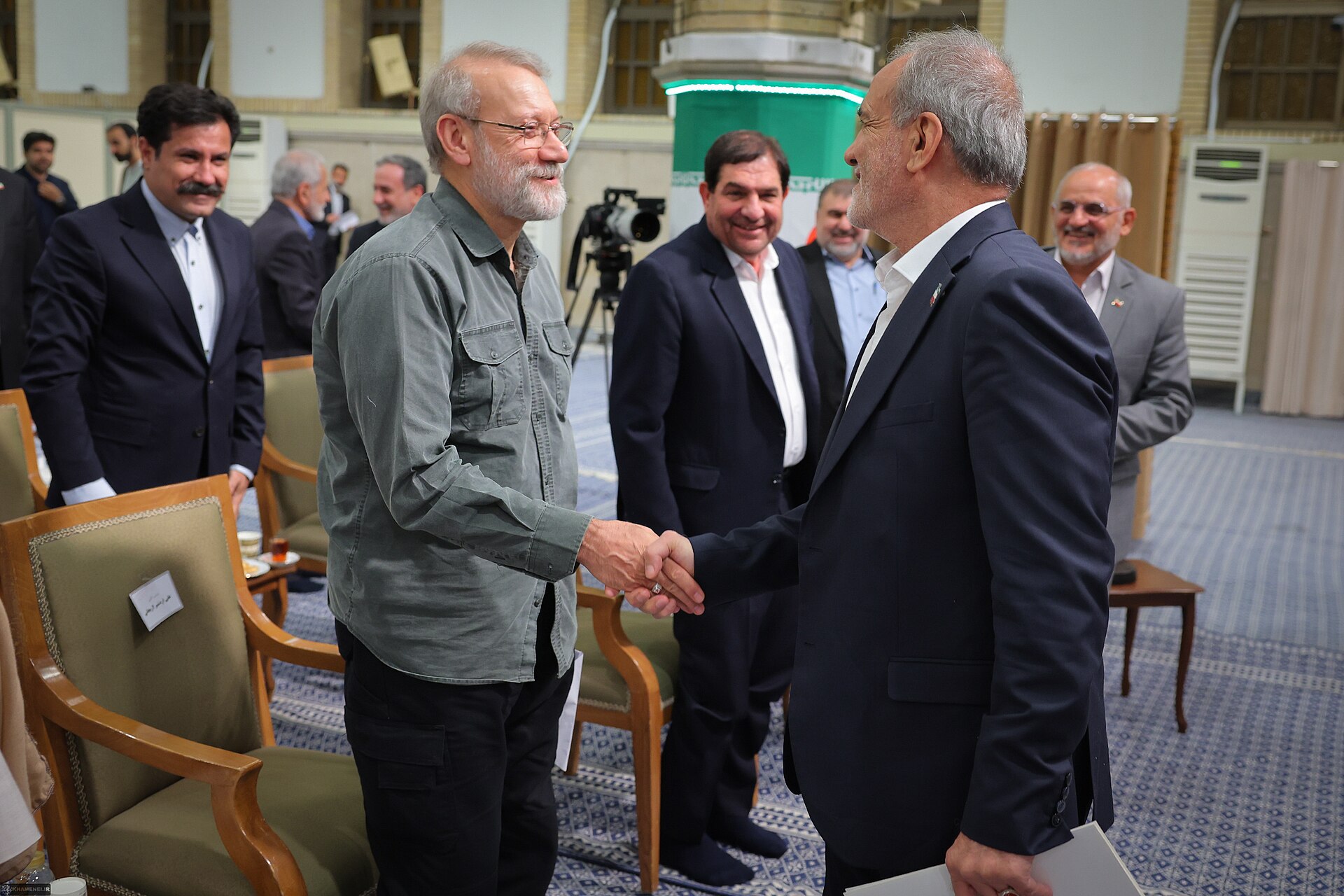 Iranian government officials in the Supreme Leader reception hall in Tehran — the ornate setting where Khamenei historically received the president and cabinet