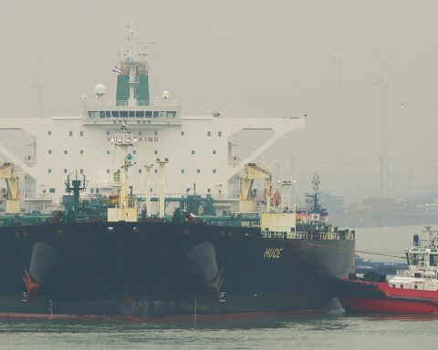 Iranian NITC supertanker Huge arriving at Rotterdam port, guided by tugboat, February 2017