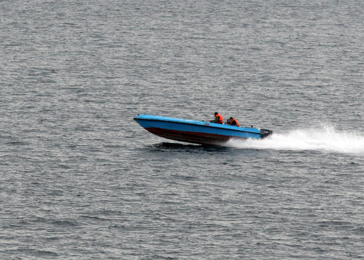 IRGC Navy fast attack craft in the Persian Gulf, January 6 2008, photographed by the US Navy as the small craft maneuvered near USS Port Royal and USS Hopper during a Strait of Hormuz transit
