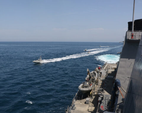 IRGC Navy fast attack boats conduct unsafe manoeuvres against USS Paul Hamilton in the Arabian Gulf, April 2020 — a demonstration of the asymmetric naval doctrine developed under Ahmadian's command