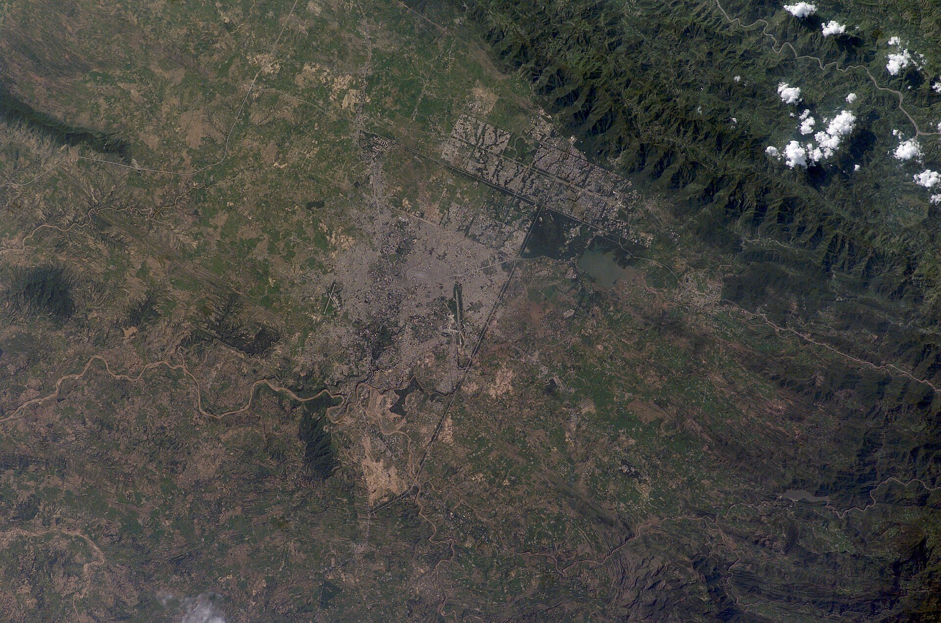 Satellite aerial view of Islamabad and Rawalpindi Pakistan — host city for Iran-US indirect ceasefire negotiations April 2026