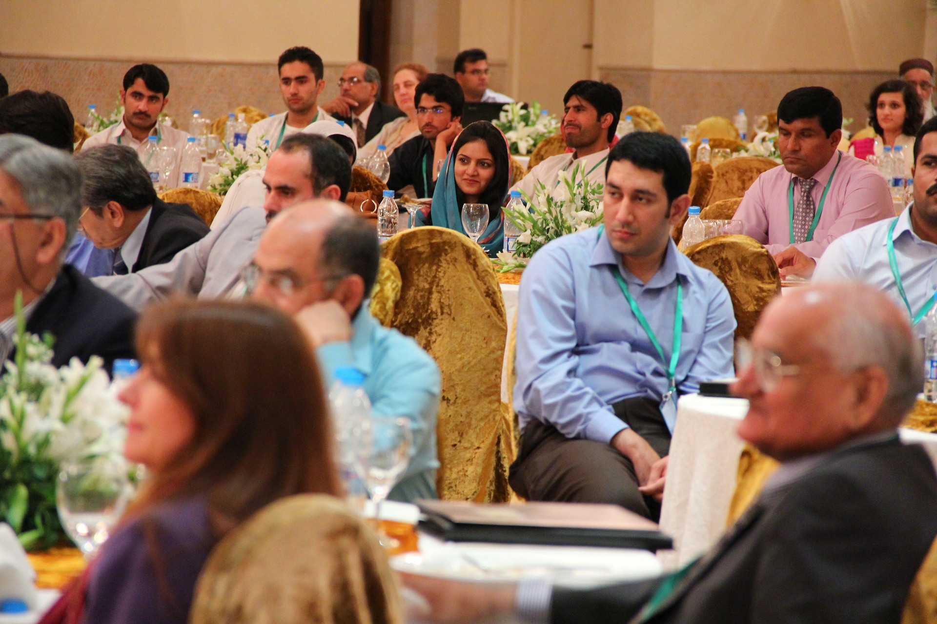 Conference proceedings at the Serena Hotel in Islamabad, Pakistan — the same venue where US and Iranian delegations opened proximity talks on April 11, 2026, while IRGC strikes continued against Saudi energy infrastructure