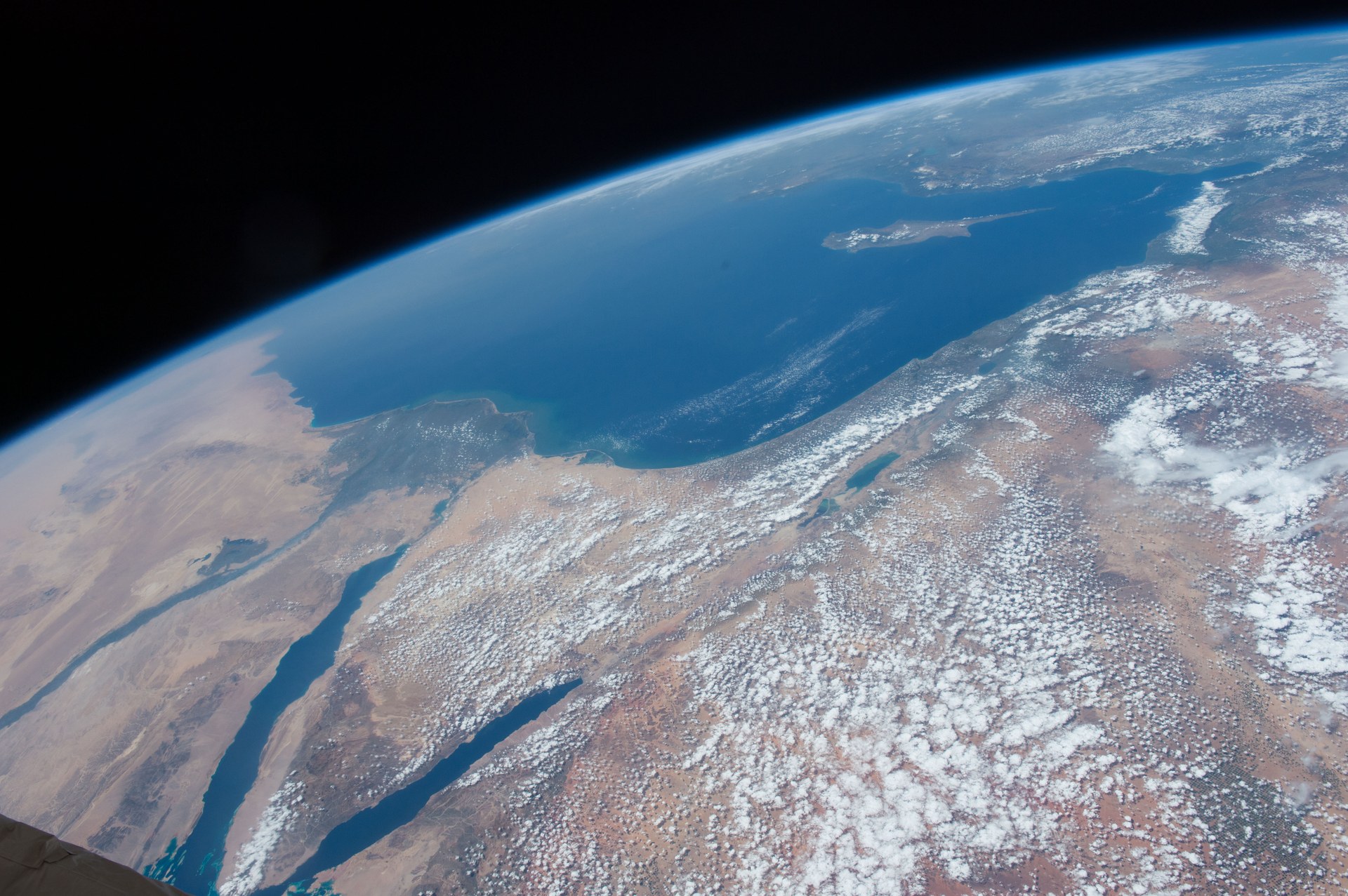 Middle East from the International Space Station — Red Sea, Suez Canal, and Arabian Peninsula visible, showing the two maritime corridors Saudi oil exports depend on