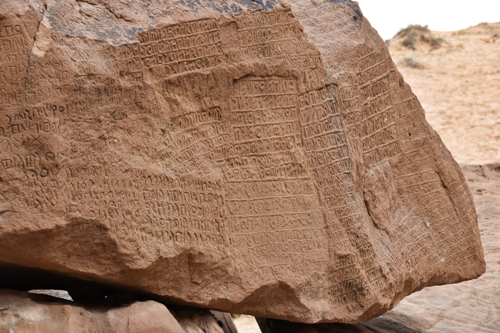 Ancient Dadanitic and Lihyanite inscriptions carved into sandstone at Jabal Ikmah, AlUla, Saudi Arabia