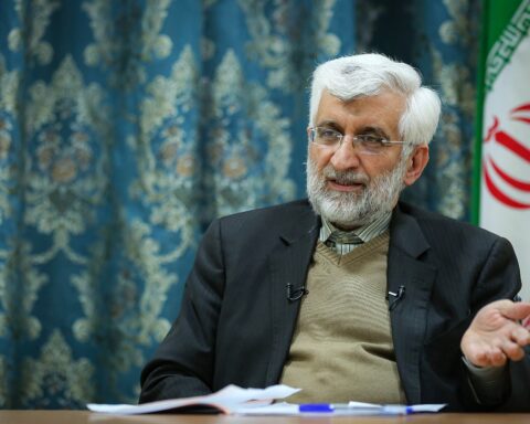 Saeed Jalili, Iran nuclear negotiator and head of the Stability Front (Paydari), speaking during a 2021 interview with the Iranian flag visible behind him