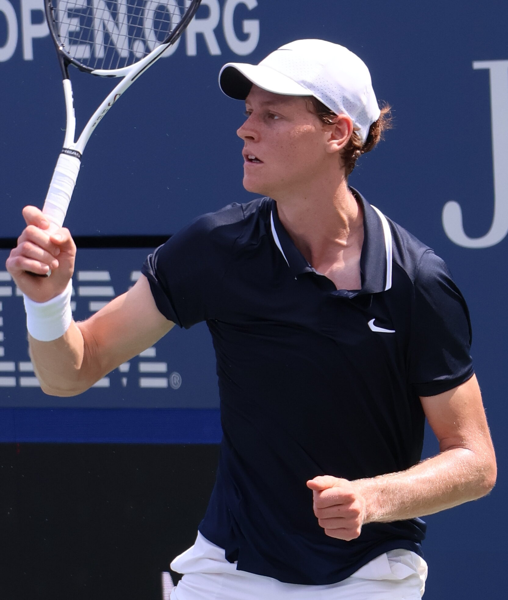 Jannik Sinner serving during a professional tennis match, the Italian won back-to-back Six Kings Slam titles in Riyadh