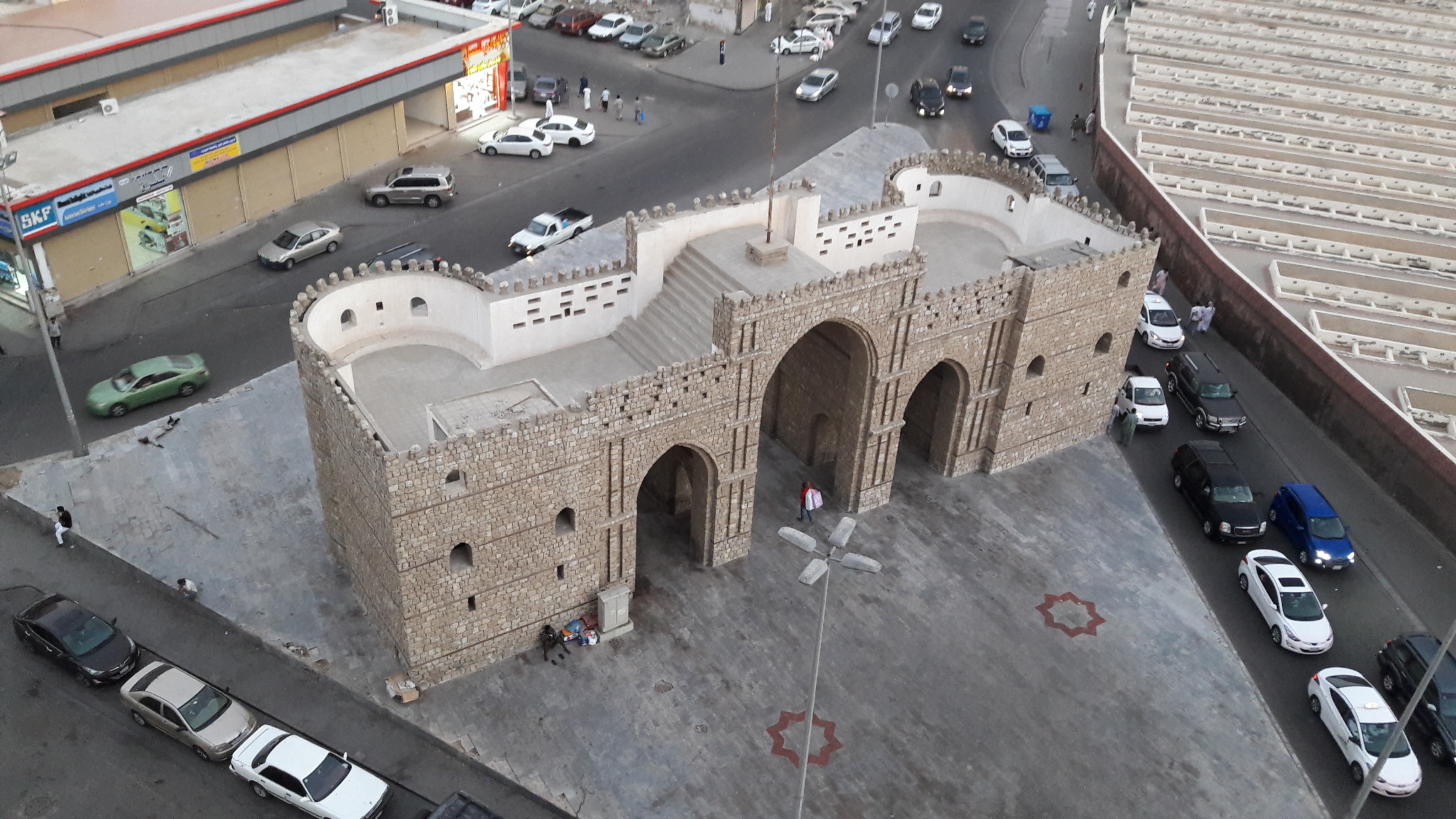 Aerial view of the historic Bab Makkah gate in Jeddah with surrounding market area