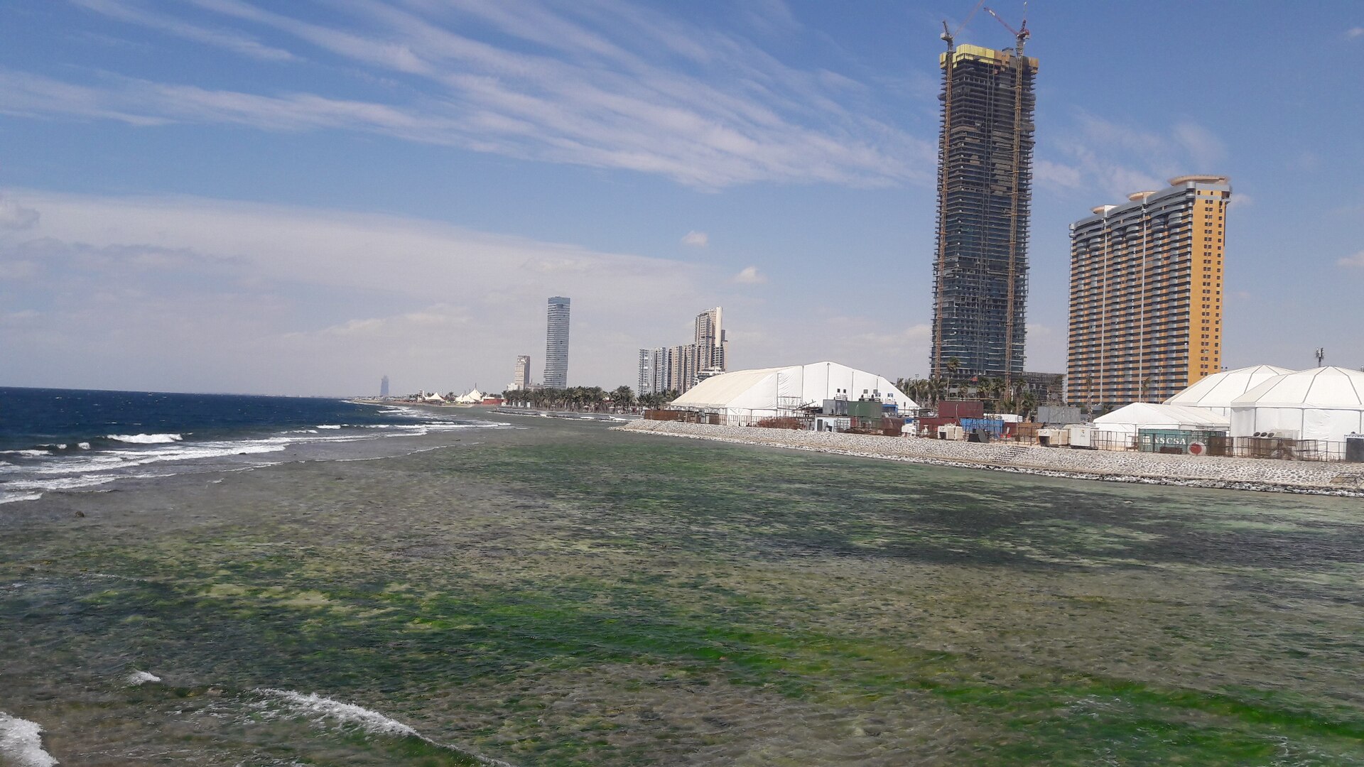 Jeddah Corniche waterfront with high-rise towers and Red Sea coastline