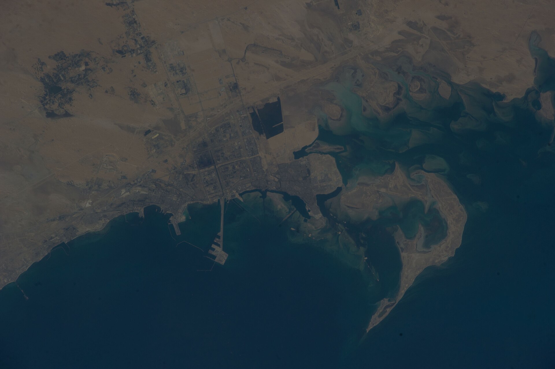 Jubail Industrial City and King Fahd Industrial Port aerial view from International Space Station ISS Expedition 39, showing the scale of Saudi Arabia Eastern Province industrial complex on the Persian Gulf