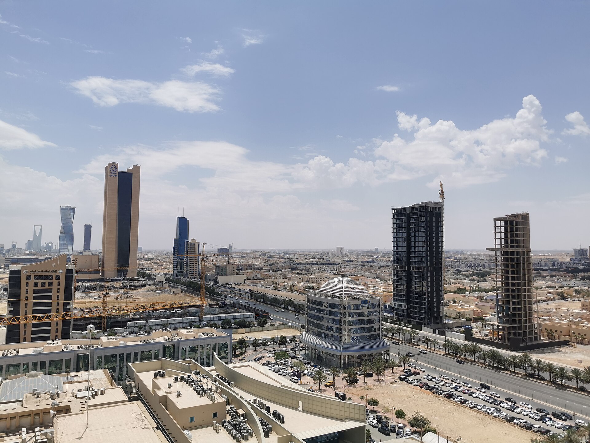 King Abdullah Financial District towers under construction in Riyadh 2023, showing the concentrated institutional architecture of Vision 2030 investment decisions