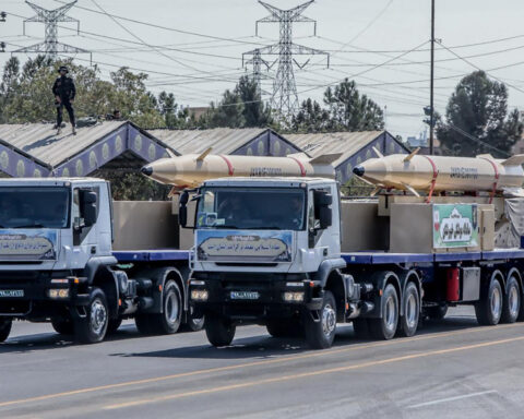 Two Kheibar Shekan ballistic missiles on mobile truck launchers at Irans Sacred Defence Week military parade 2023