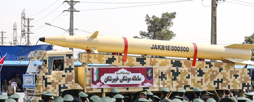 Kheibar Shekan ballistic missile system on mobile launcher displayed at IRGC parade with uniformed troops