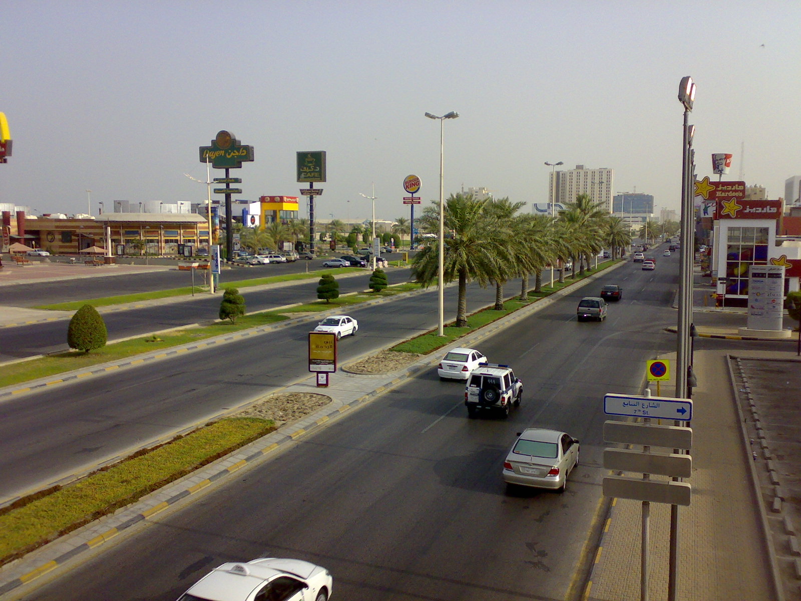 The palm-lined Prince Turki bin Abdulaziz Street running along the Al Khobar Corniche, with shops and restaurants on both sides