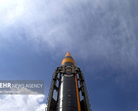 Khorramshahr-4 (Kheibar) ballistic missile on erector at official unveiling ceremony, Iran, May 2023 — the missile carries a 1,500–1,800 kg warhead with maneuverable reentry vehicle