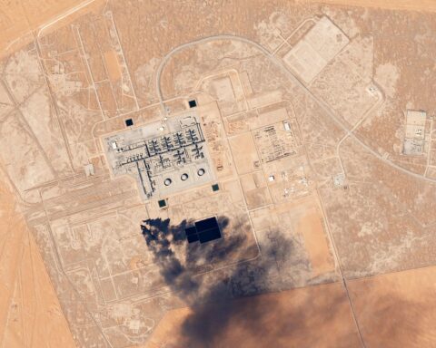 Satellite image of Khurais oil processing facility in Saudi Arabia with black smoke plume from April 2026 strikes, Planet Labs